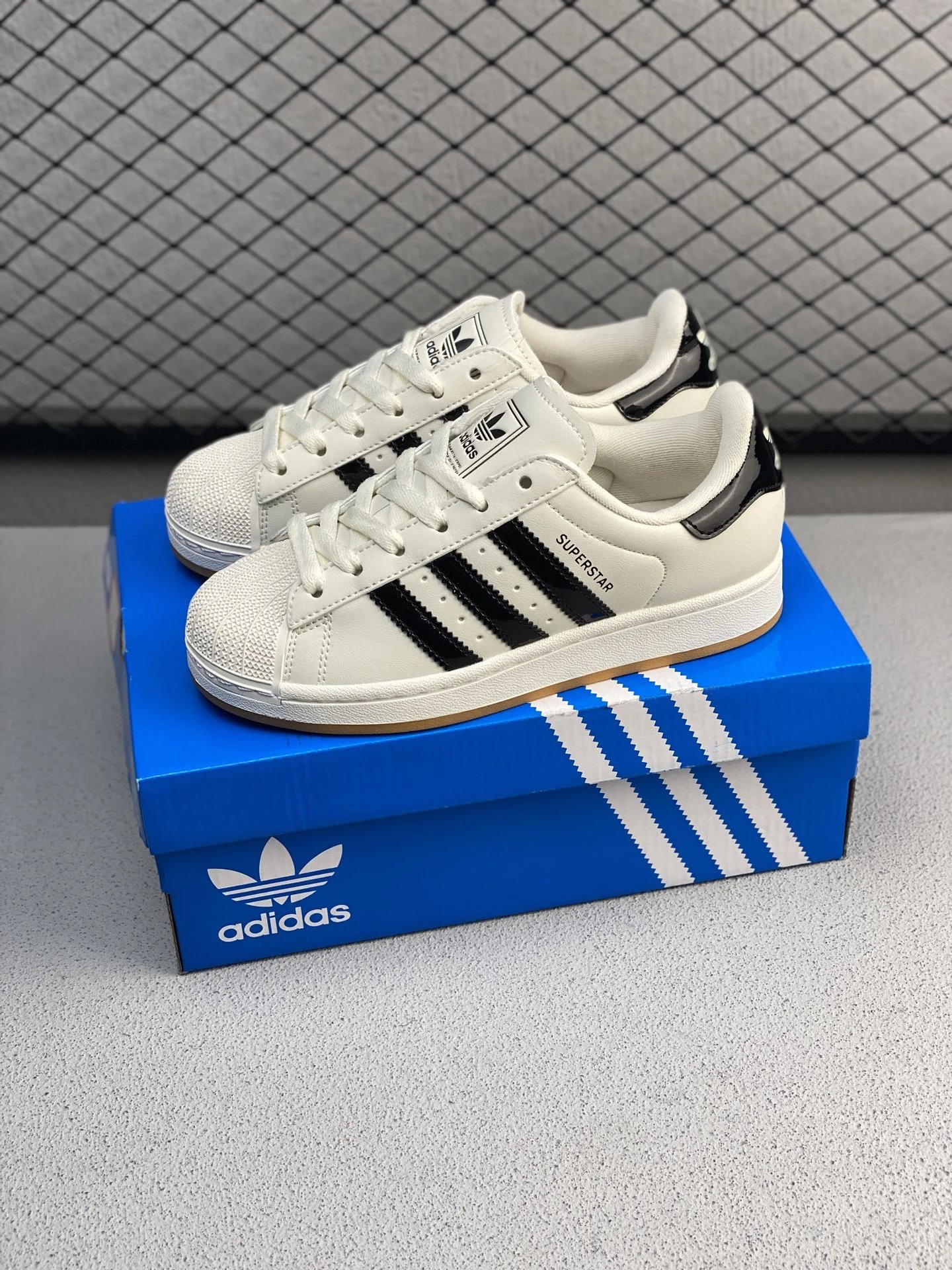Adidas Shell-Toe Sneakers in White and Black, Finished with Shell-Toe Detail