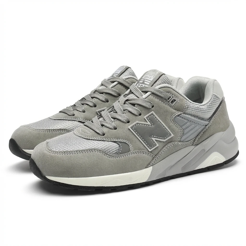 New Balance retro-style grey sports shoes