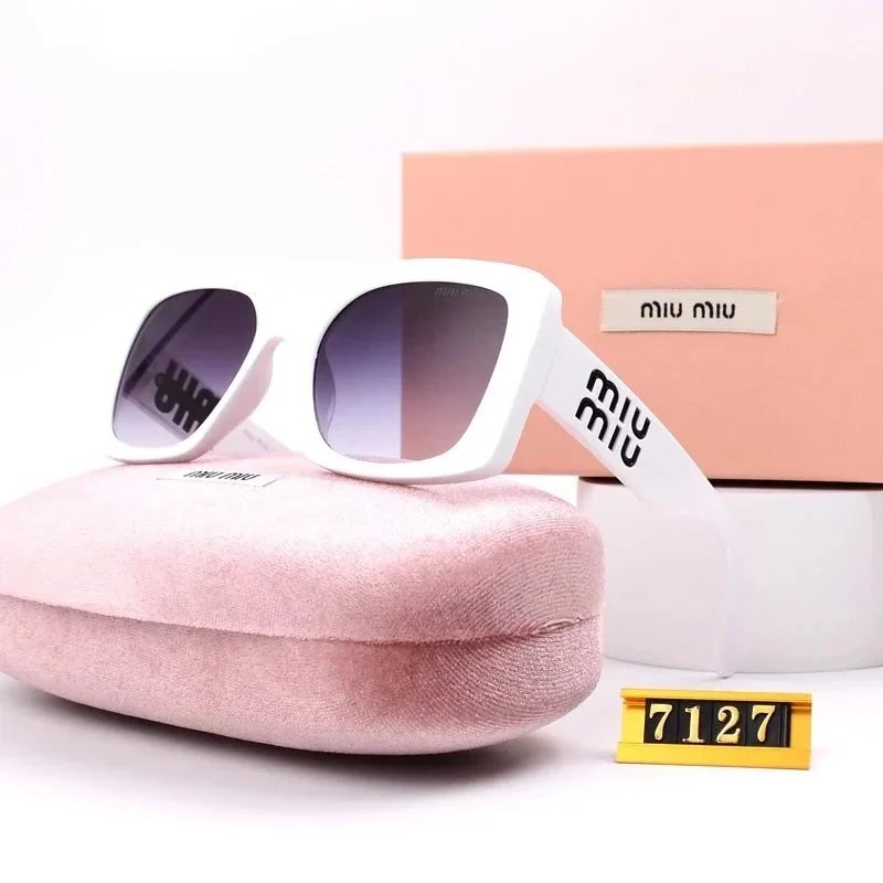 Miu Miu Weekend Oversized sunglasses Black Oval Sunglasses for Seasonal Looks