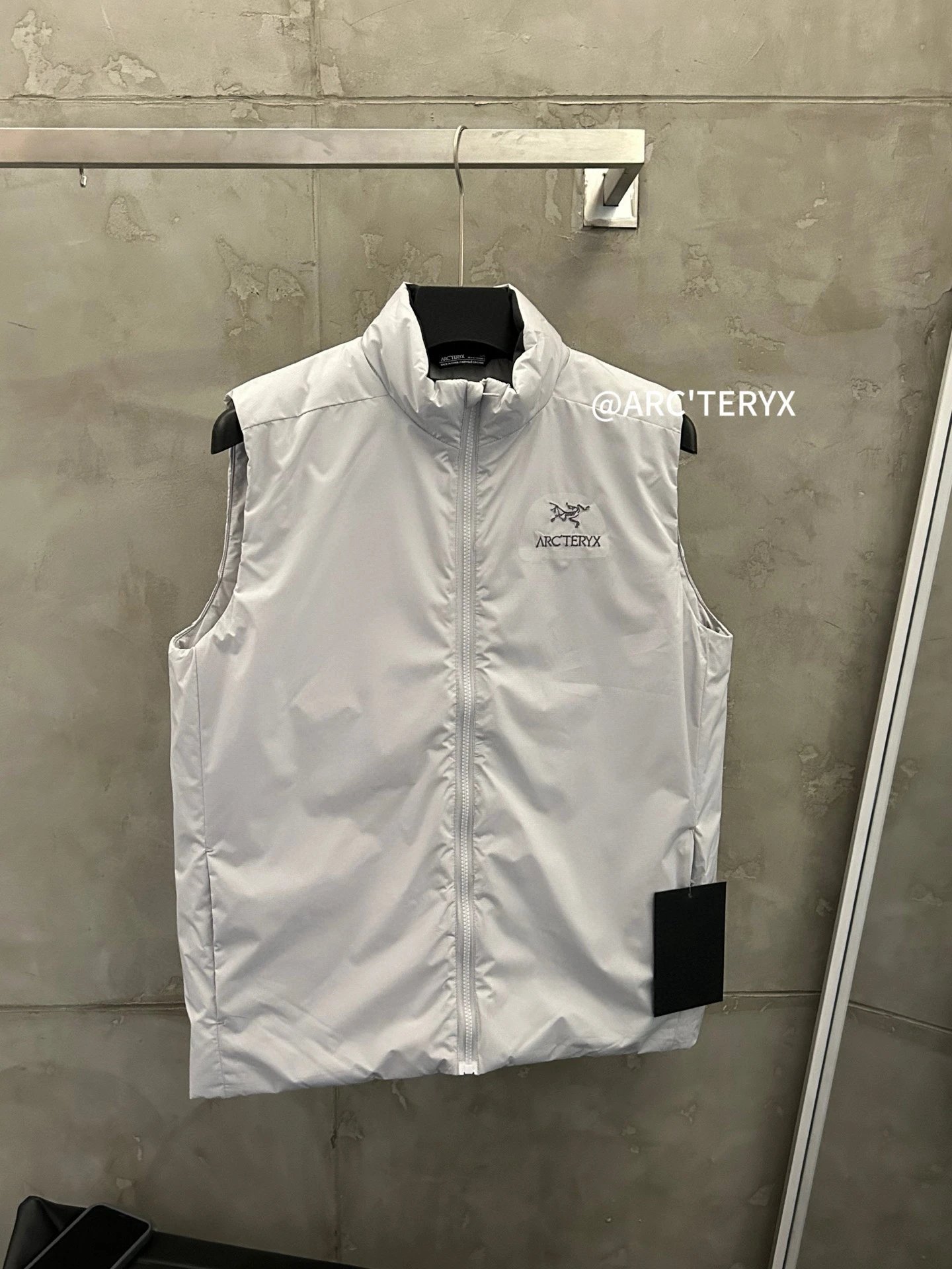 Arc'teryx Light Gray Lightweight Shell Vest with sleeveless profile