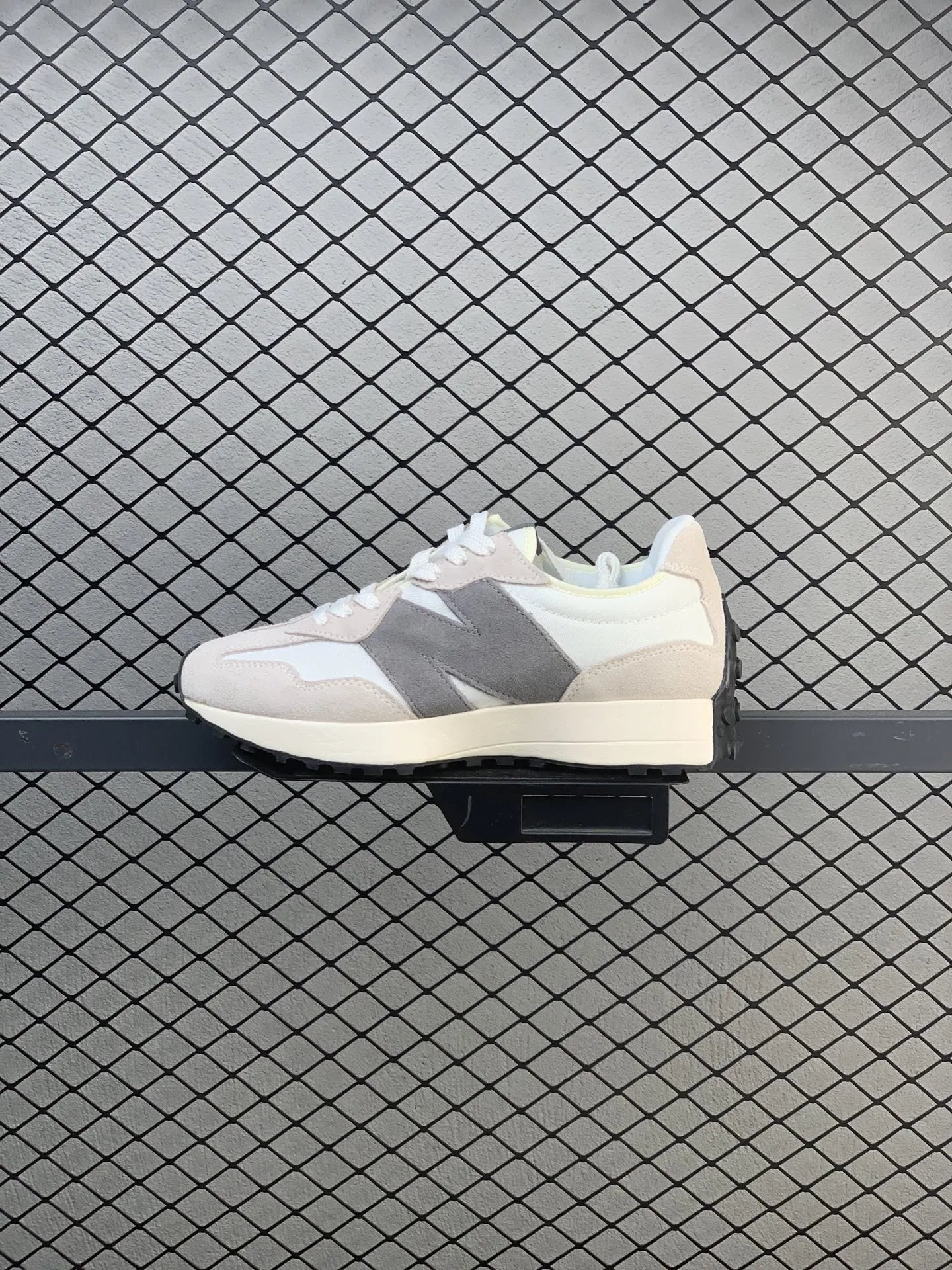 New Balance Gray Retro Runners Highlighting Road Runner Profile