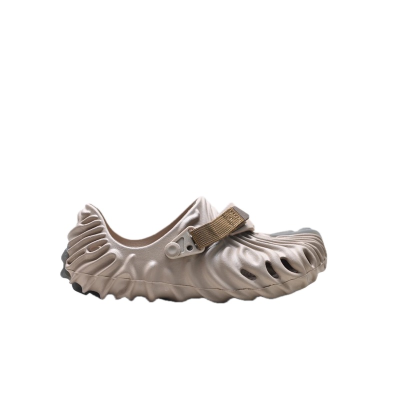Fashionable beige Crocs clogs