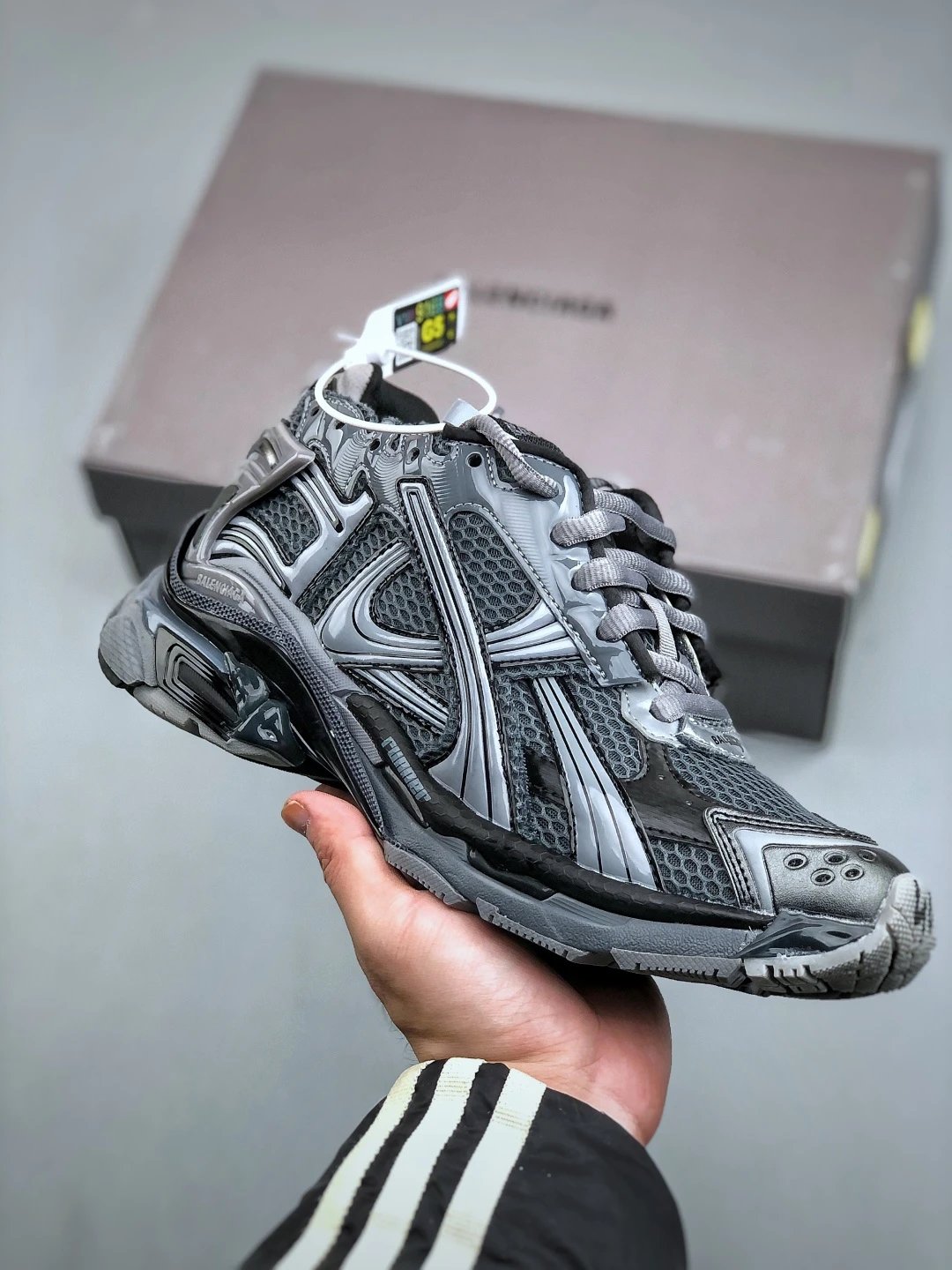 Gray Runner Sneaker by Balenciaga with Gray Layered Runner in Hand