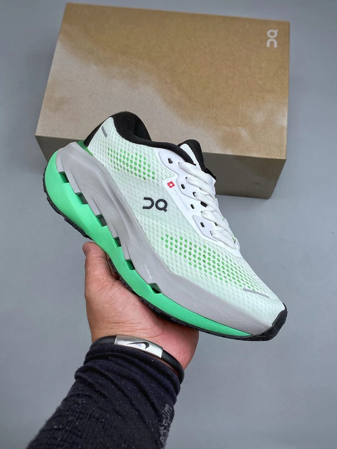 On White and Green Cloud Runners and Cloud-Look Cushioning
