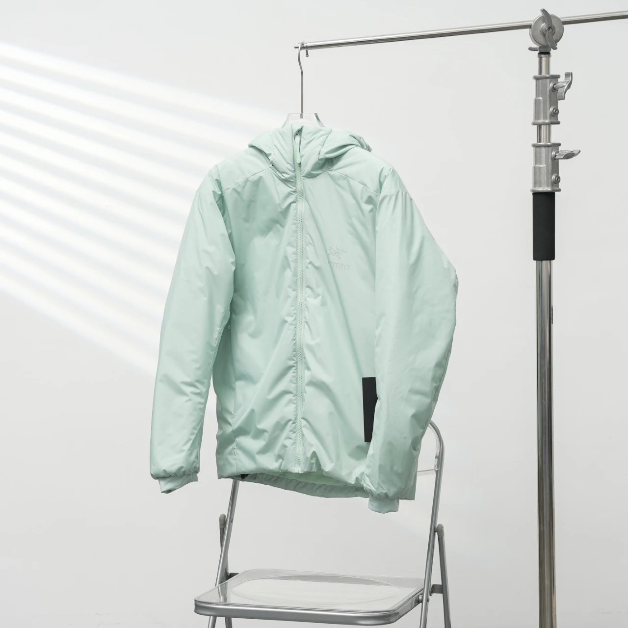 Clean Hooded Profile And Minimal Chest Branding Arc'teryx Lightweight Shell Jacket in Mint Green