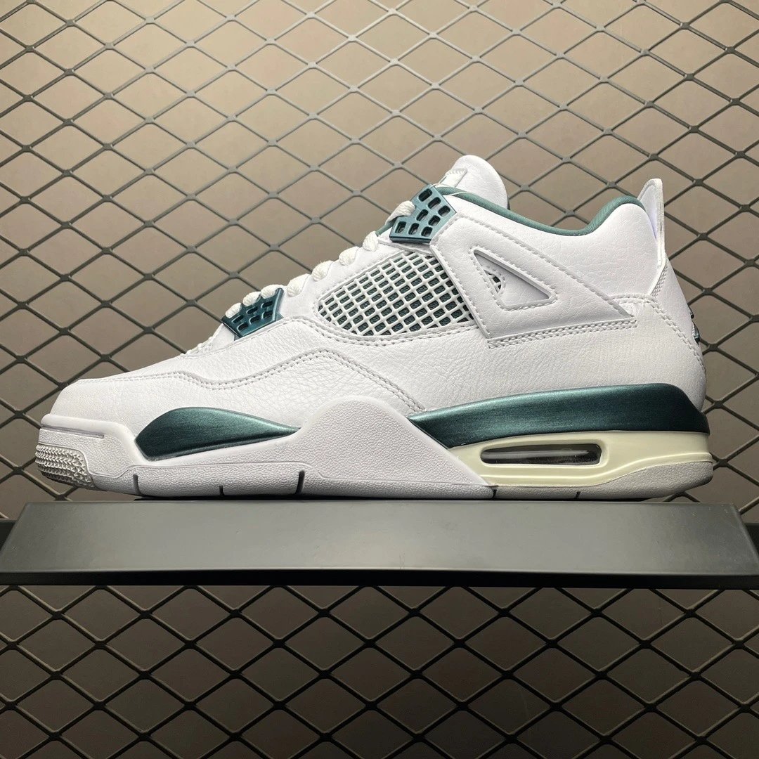 Jordan White and Green Basketball High-Tops Defined by Sculpted Heel