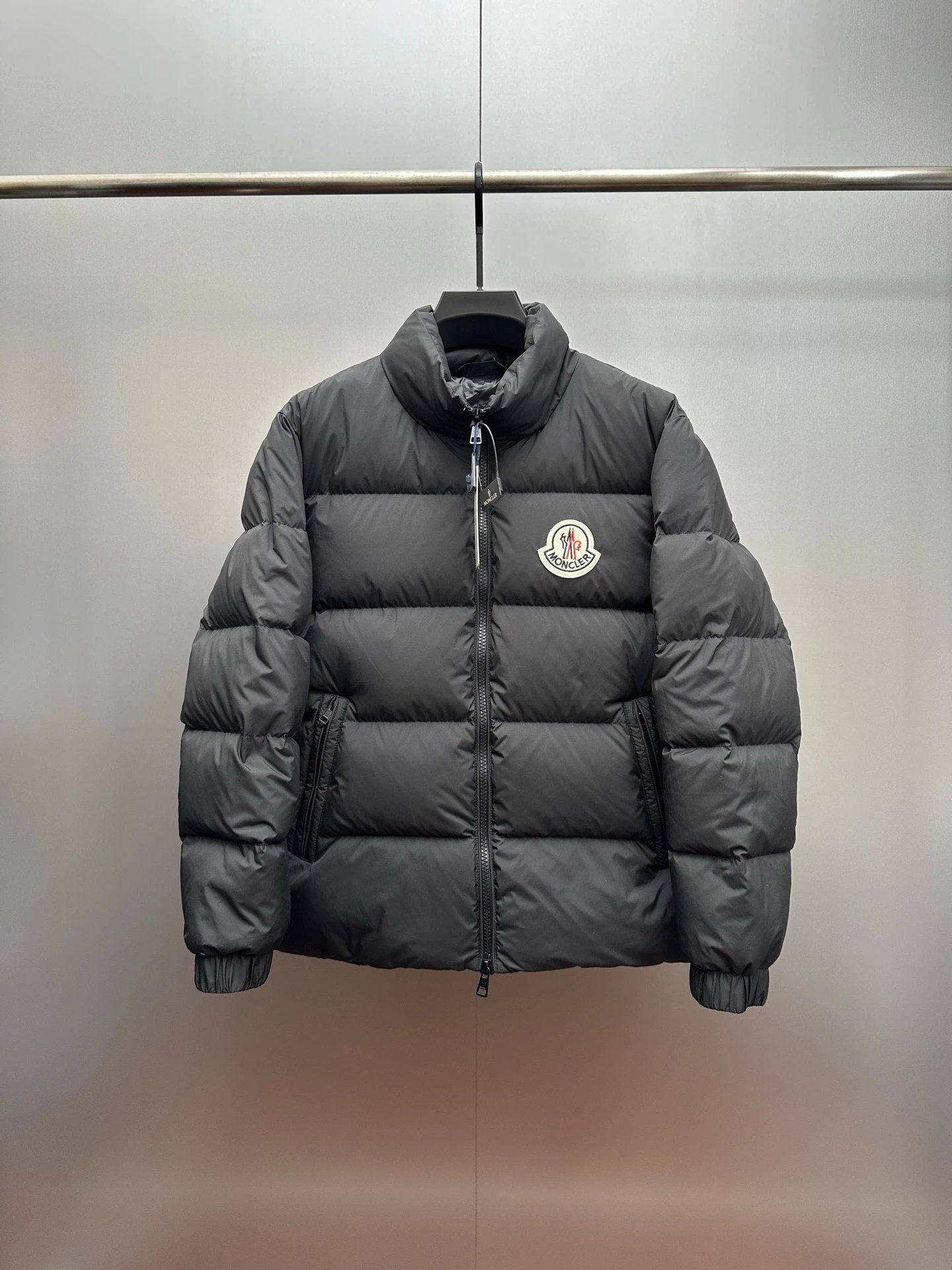 Short Puffer Jacket with Badge Detail from Moncler