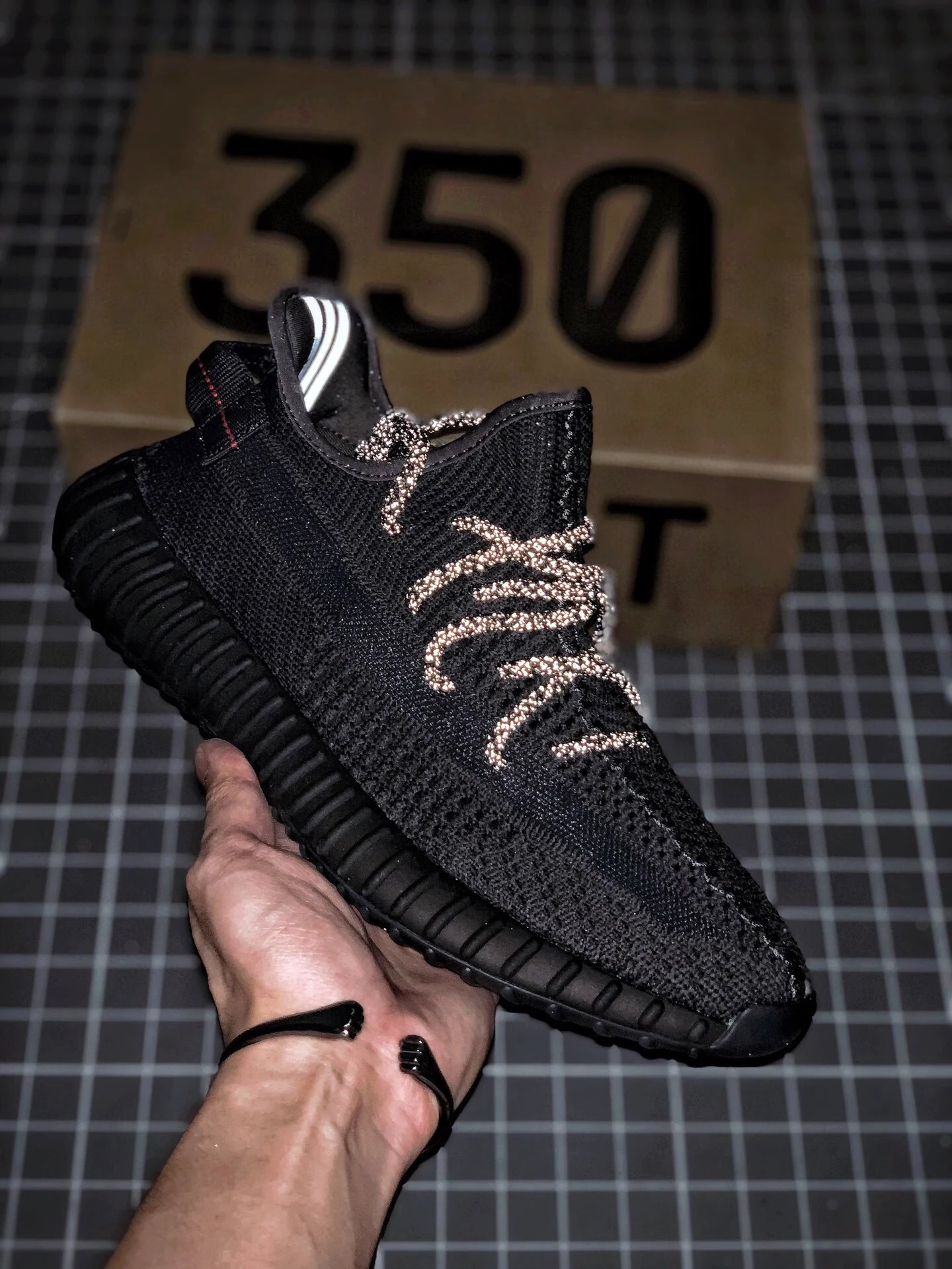 Yeezy Black Knit Sneakers Defined by Sock-Like Collar