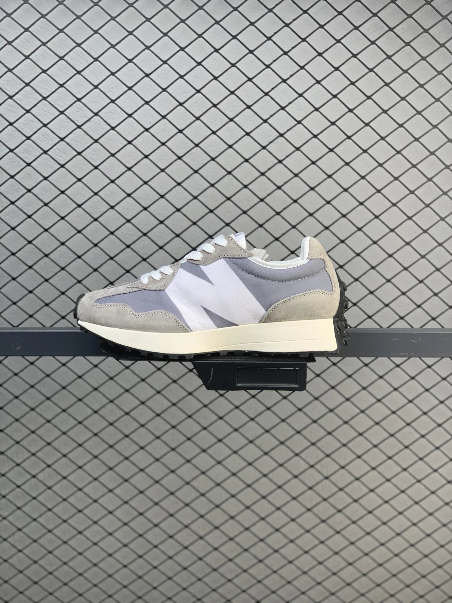 New Balance Pale Gray Retro Runners Highlighting Dynamic Sole Shape