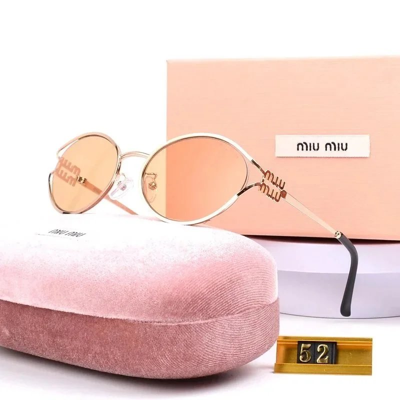 Miu Miu Streetwear Oversized sunglasses Black Oval Sunglasses with Logo Accent