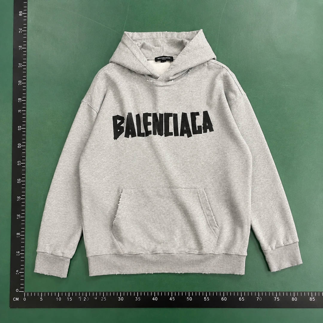 Gray Hoodie with Bold Balenciaga Balenciaga Hoodie with Button Detail QC photo