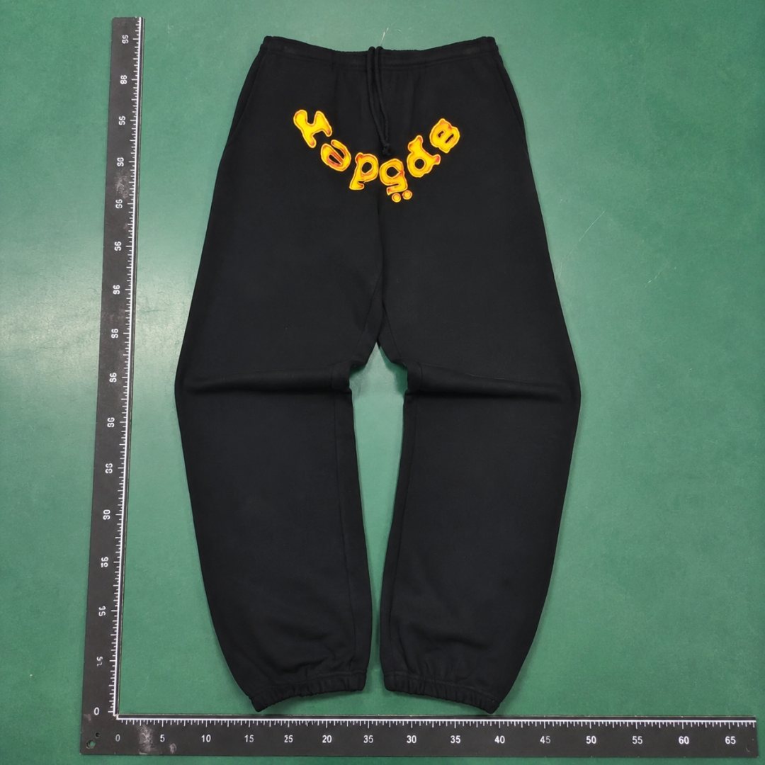 Bold Yellow Wordmark Graphics And Cuffed Hems Black Sp5der Logo Sweatpants QC photo