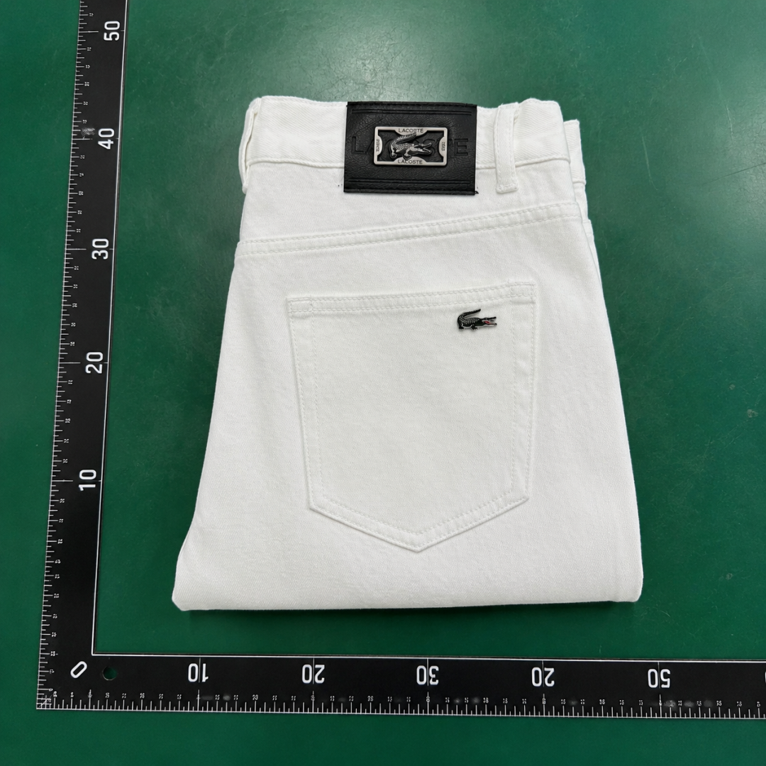 Logo Jeans with green crocodile emblem and clean back pocket - Lacoste Weekend Edit QC photo