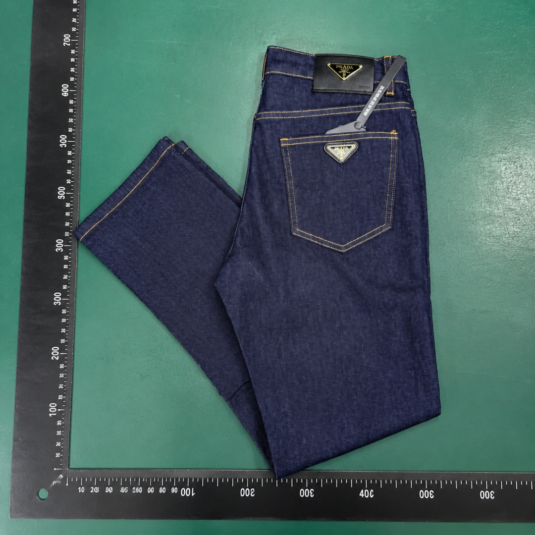 Prada Dark Indigo Logo Jeans with triangle badge hardware and contrast pocket stitching QC photo