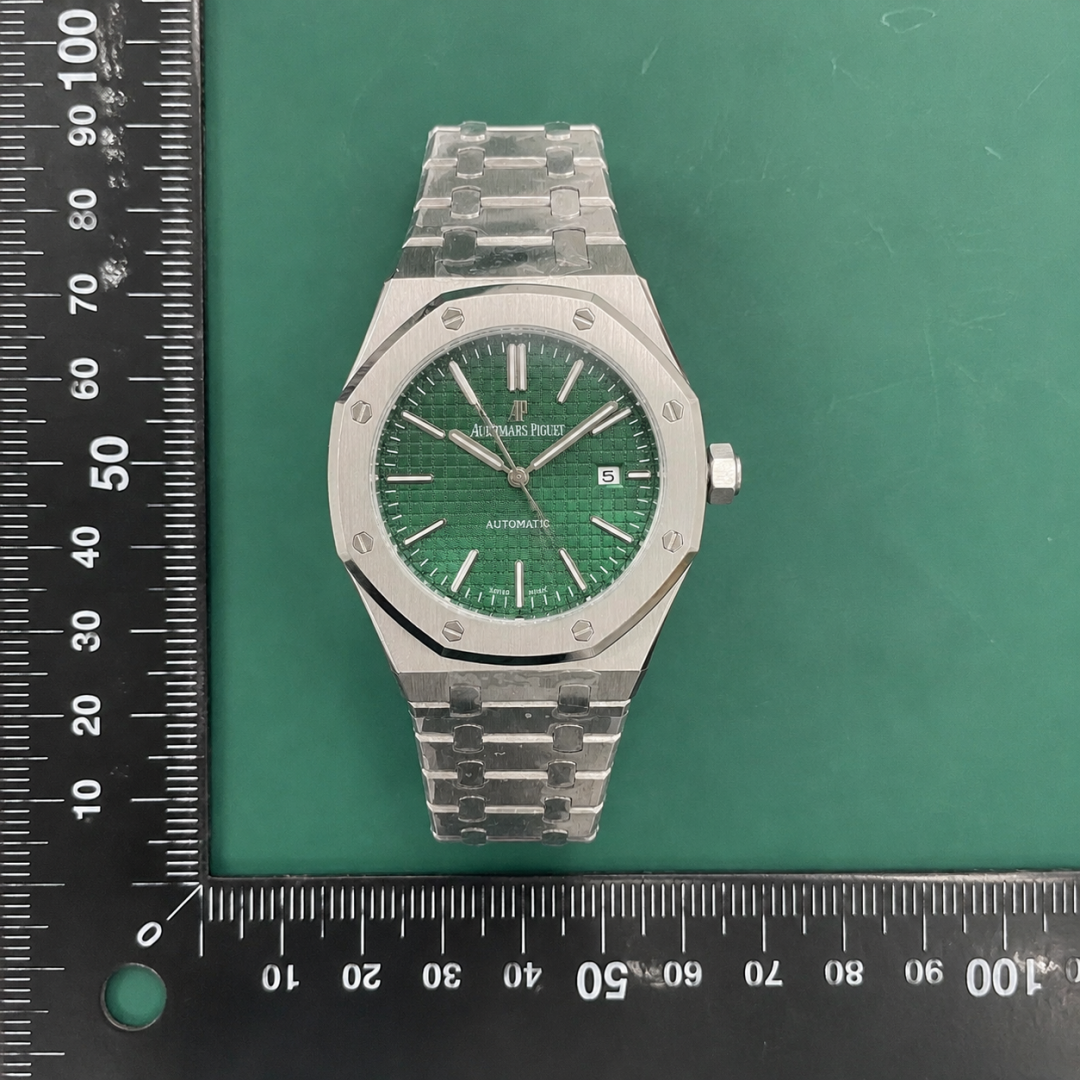 Royal Oak Automatic Watch in Silver And Green with green textured dial and integrated metal bracelet - Audemars Piguet QC photo